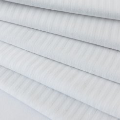 A stack of white satin linen towels