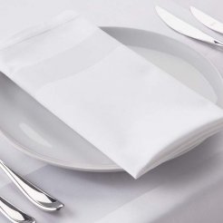 A table set with silverware and a white napkin with a satin band